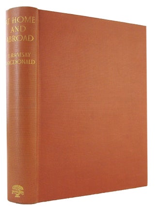 AT HOME AND ABROAD: Essays.
